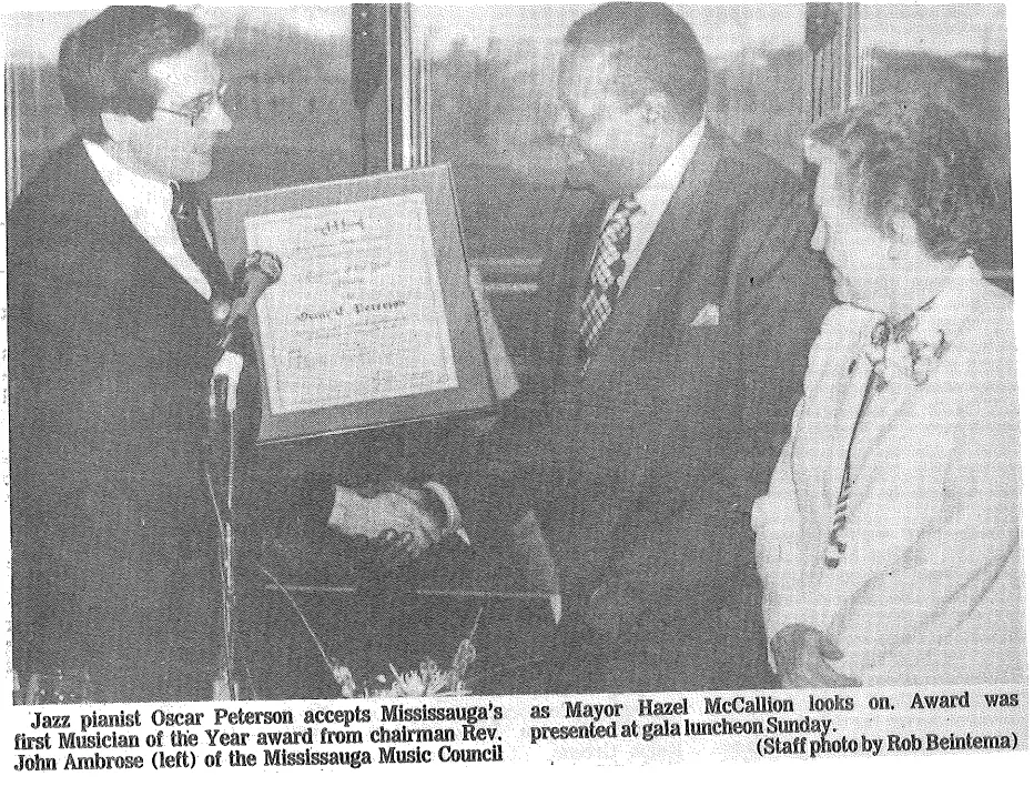 Newspaper clipping of Mississauga Music Council awarding Oscar Peterson the Musician of the Year Award in 1983. Mayor Hazel McCallion stands next to him. 