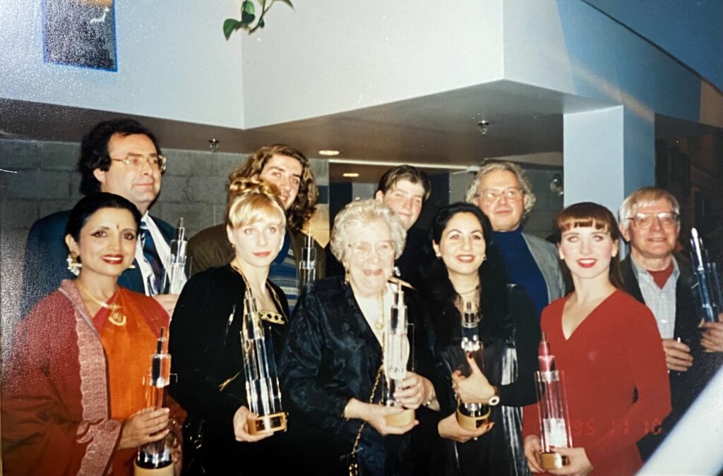 Winners of the 1995 Mississauga Arts Awards hold their trophies and pose in the lobby of Meadowvale Theatre.